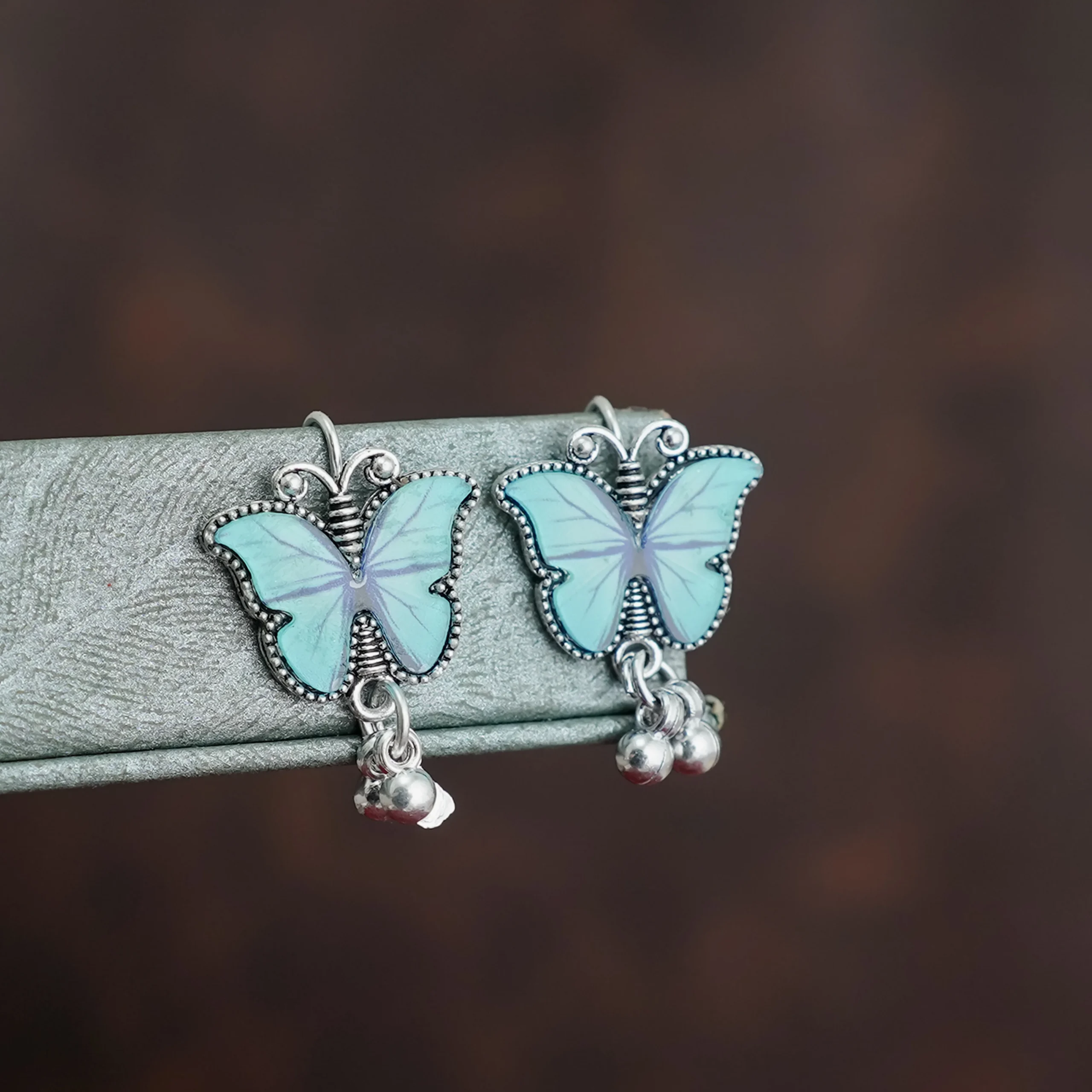 Sky Blue Butterfly Charm Jhumka for Women - Image 3