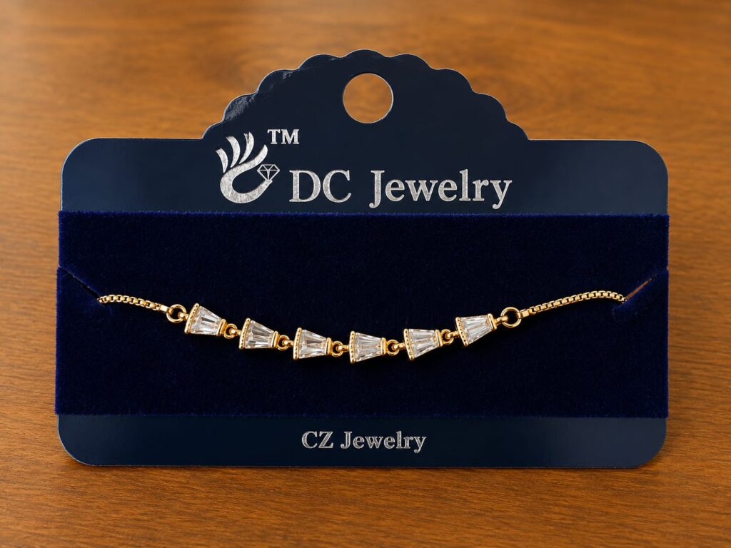 Square Stone Bracelet in gold-tone style with a row of angled clear square stone-like accents