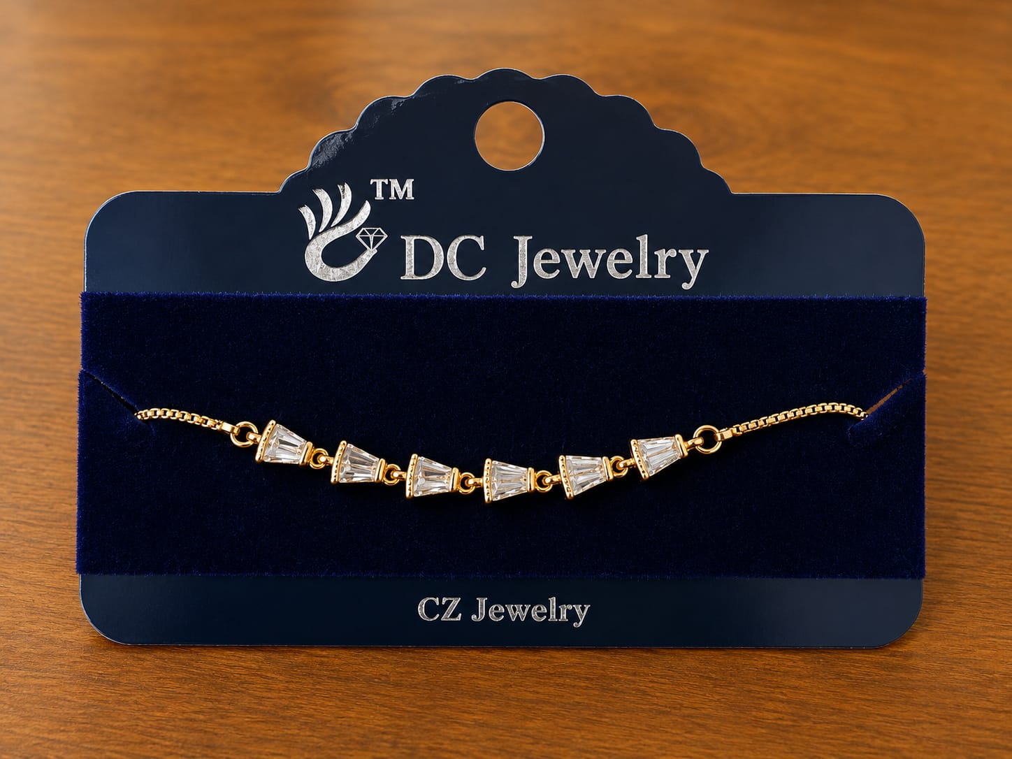 Square Stone Bracelet in gold-tone style with a row of angled clear square stone-like accents