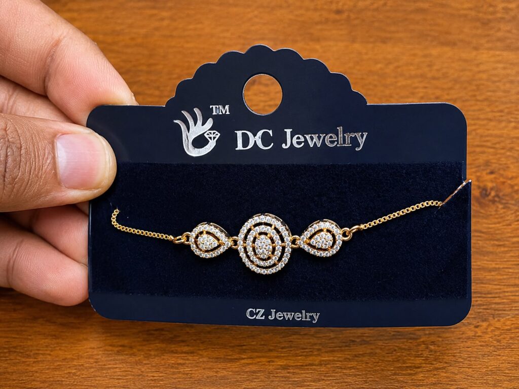 Circle Halo Bracelet in gold-tone style with three linked circular clear-stone halo motifs
