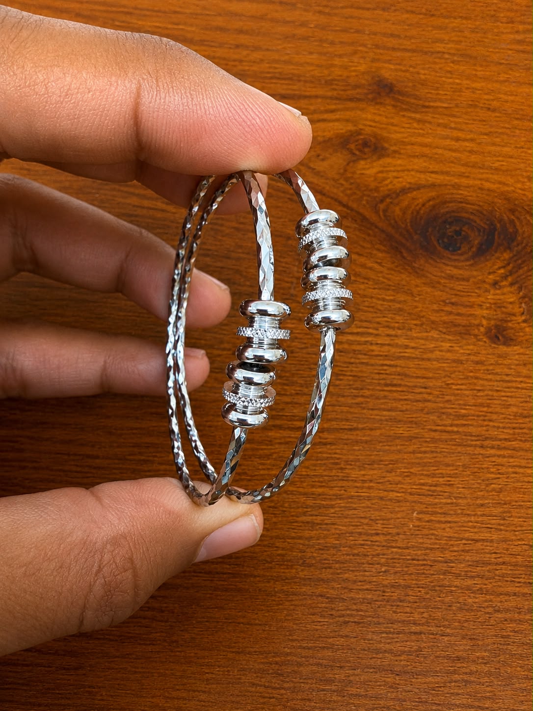 Single Spiral Cuff Bracelet in silver-tone style with a double-wire cuff with a clear spiral centre detail