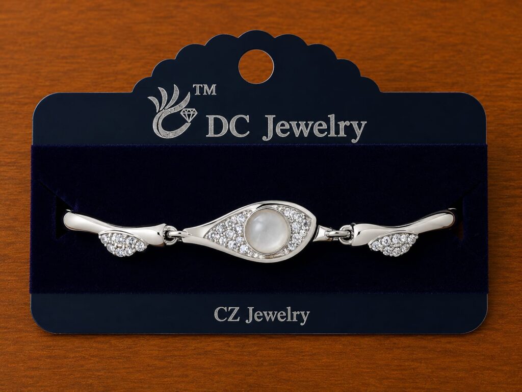 Pearl Eye Bracelet in silver-tone style with a pearl-like centre within a clear eye-shaped frame