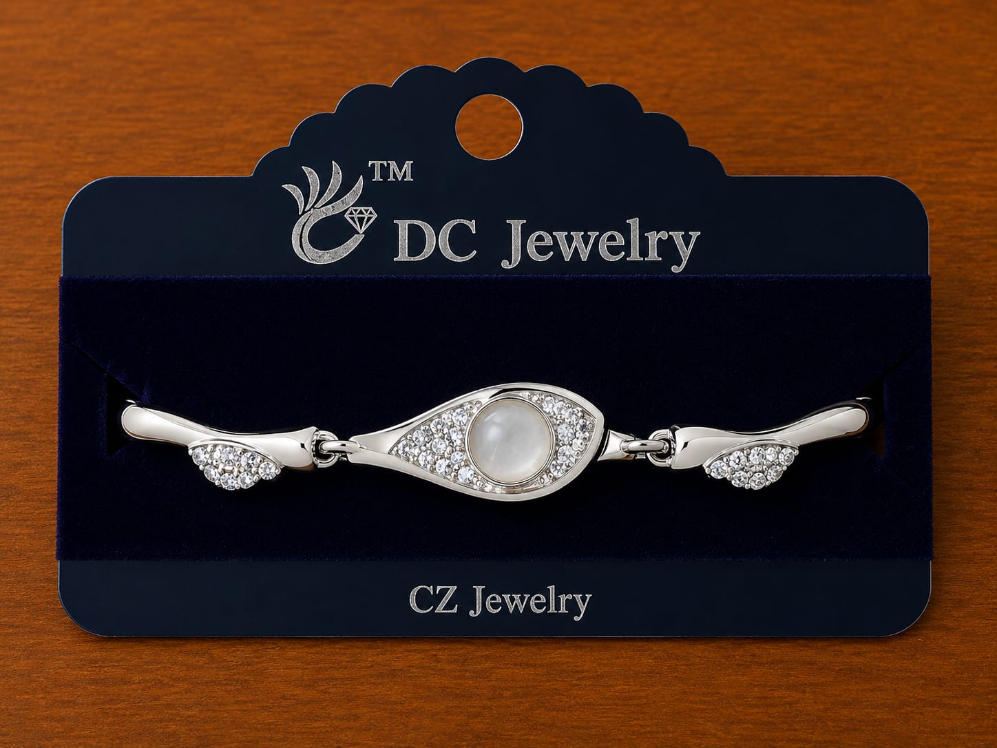 Pearl Eye Bracelet in silver-tone style with a pearl-like centre within a clear eye-shaped frame