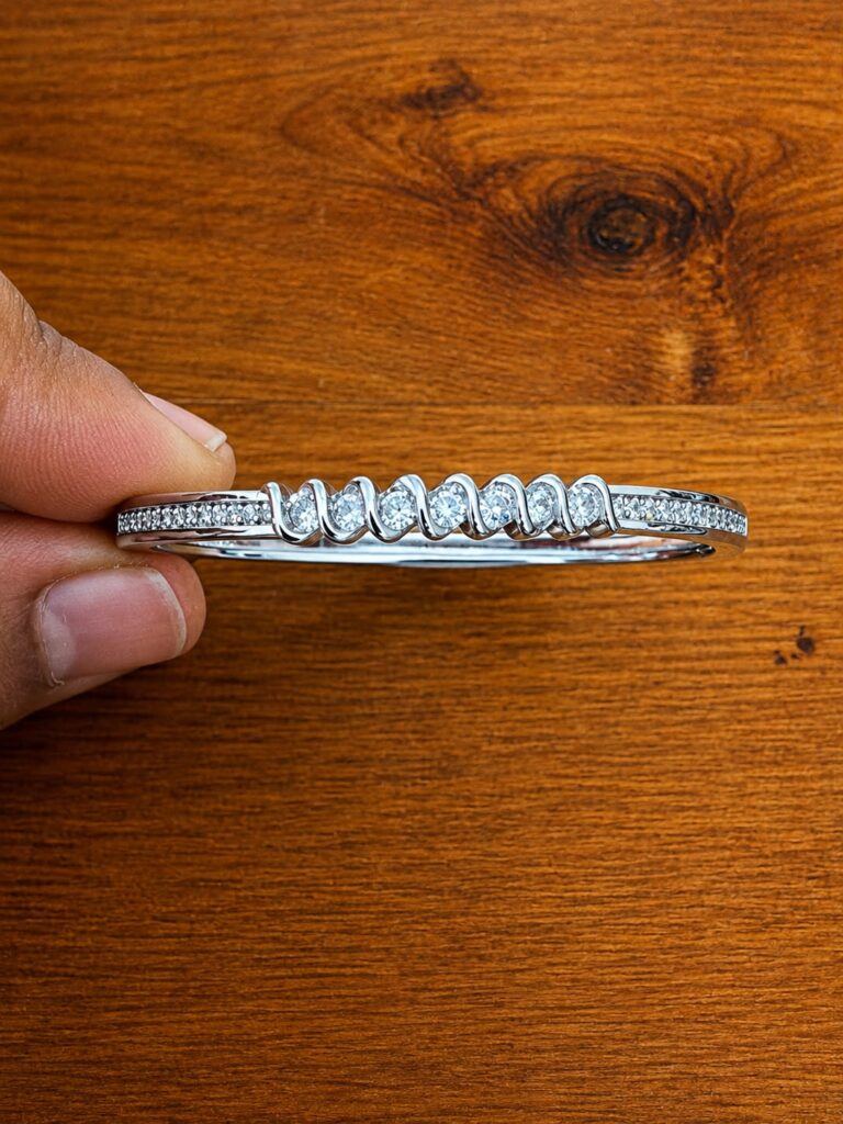 Clear Leaf Bar Bracelet in silver-tone style with a graduated row of clear leaf-shaped accents