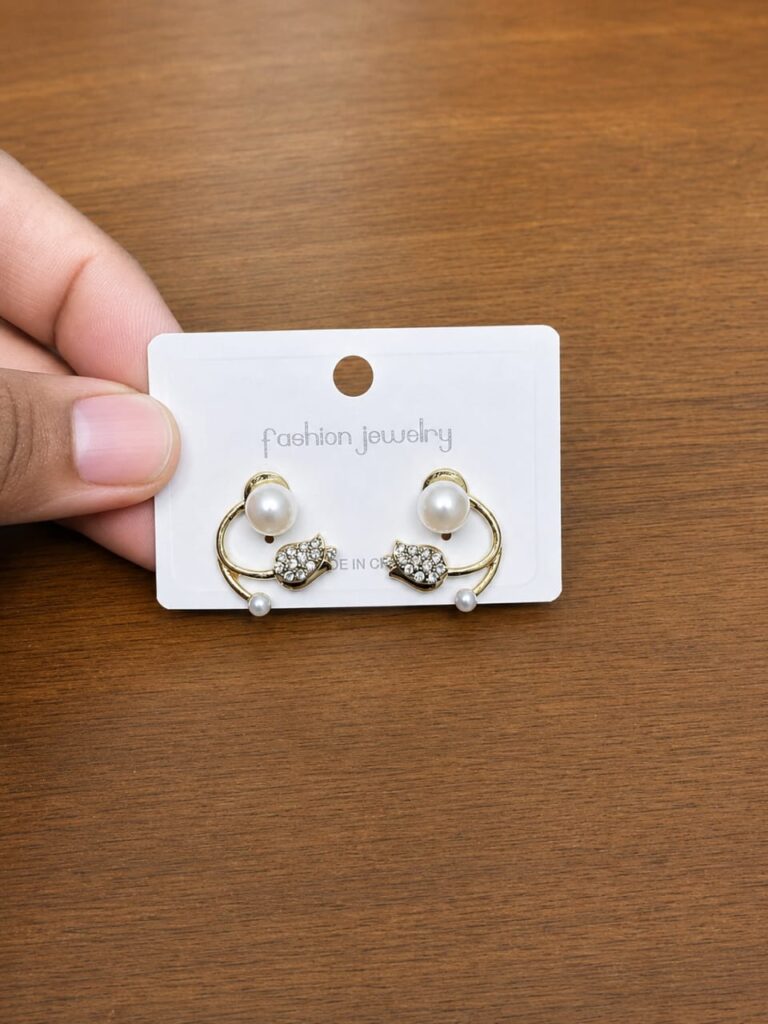 Pearl Swan Stud Earrings in gold-tone style with open swan-like curves with pearl-like and clear accents