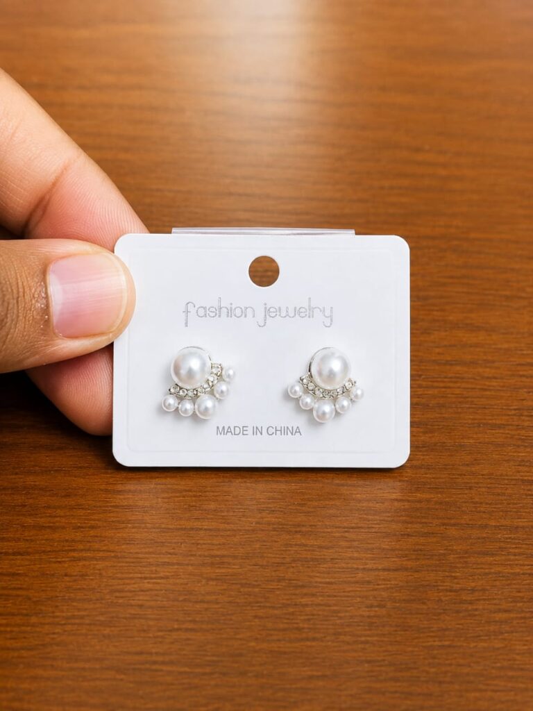 Pearl Cluster Stud Earrings in silver-tone style with a pearl-like centre framed by a compact clear cluster