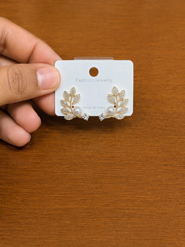 Leaf Cluster Pearl Stud Earrings in gold-tone style with leaf clusters with a pearl-like detail at the base