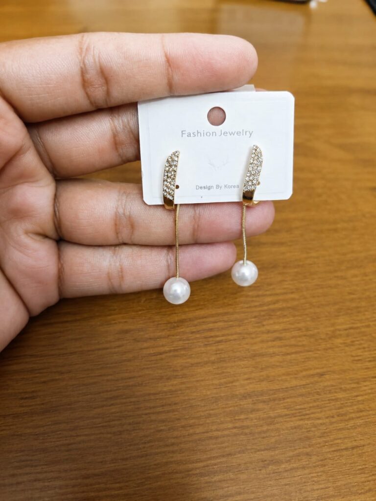 Long Bar Pearl Drop Earrings in gold-tone style with slim clear bars ending in pearl-like drops