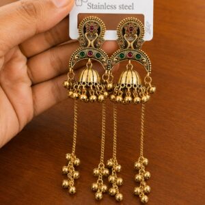 Peacock Jhumka Tassel Earrings in antique gold-tone style with peacock-inspired arches, domes and long bead tassels