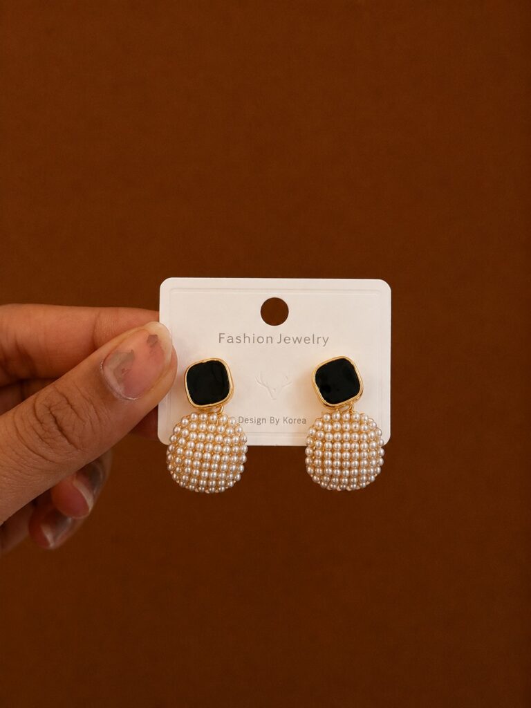 Black Square Pearl Drop Earrings in gold-tone style with black square tops above grid-pattern pearl-like drops
