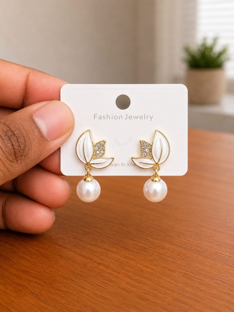 Leaf Pearl Drop Earrings in gold-tone style with white leaf forms above pearl-like drops