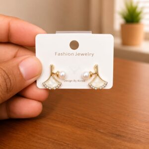 Bell Stud Earrings in gold-tone style with small white bell-shaped motifs with clear borders