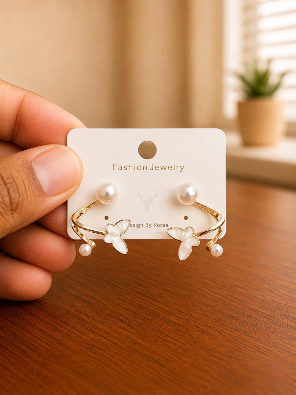 Curved Butterfly Pearl Ear Jacket Earrings in gold-tone style with pearl-like studs with curved butterfly ear jackets