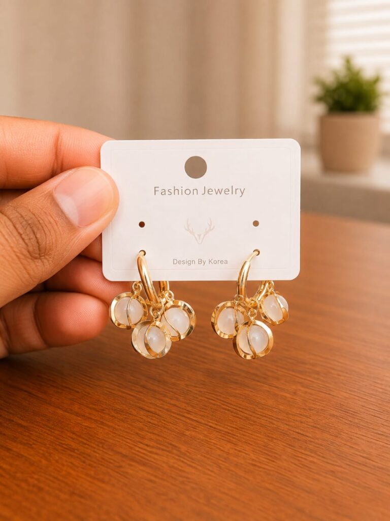 Cluster Clear Drop Earrings in gold-tone style with clusters of clear oval drops on small hoops