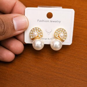 Pearl Sunburst Drop Earrings in gold-tone style with clear sunburst circles above large pearl-like drops