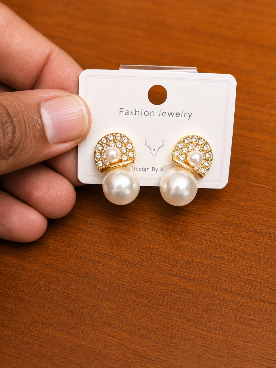 Pearl Sunburst Drop Earrings in gold-tone style with clear sunburst circles above large pearl-like drops