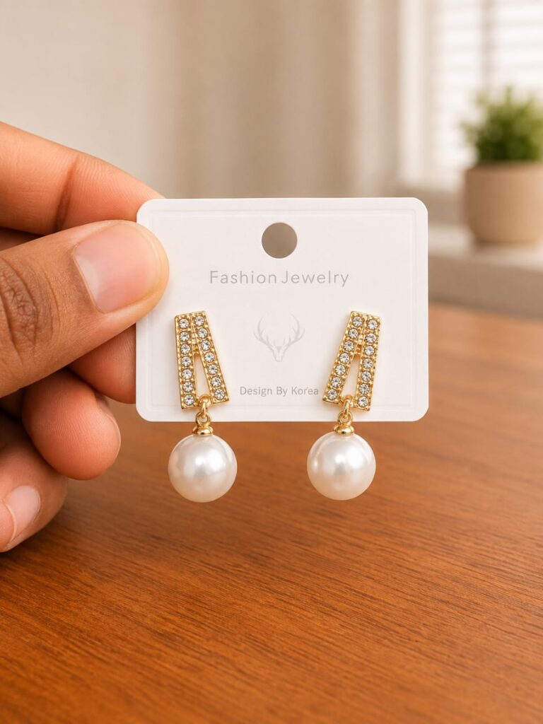 Bar Pearl Drop Earrings in gold-tone style with tapered clear bars with large pearl-like drops