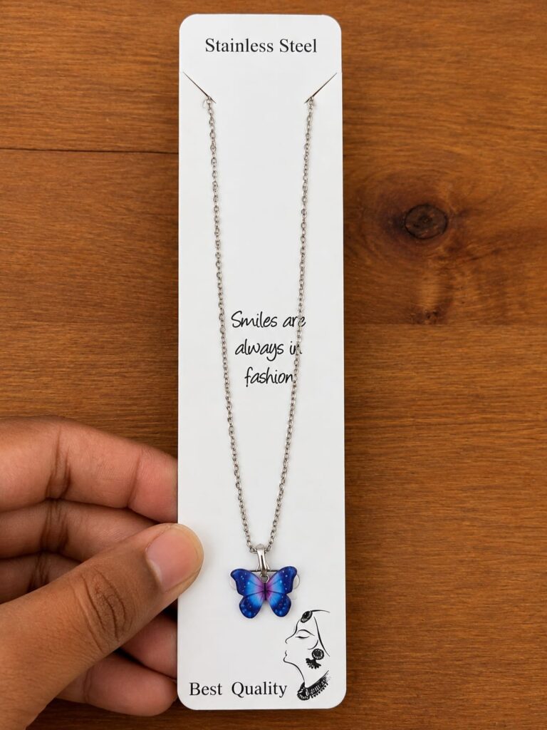 Silver-tone necklace with a blue and purple butterfly pendant