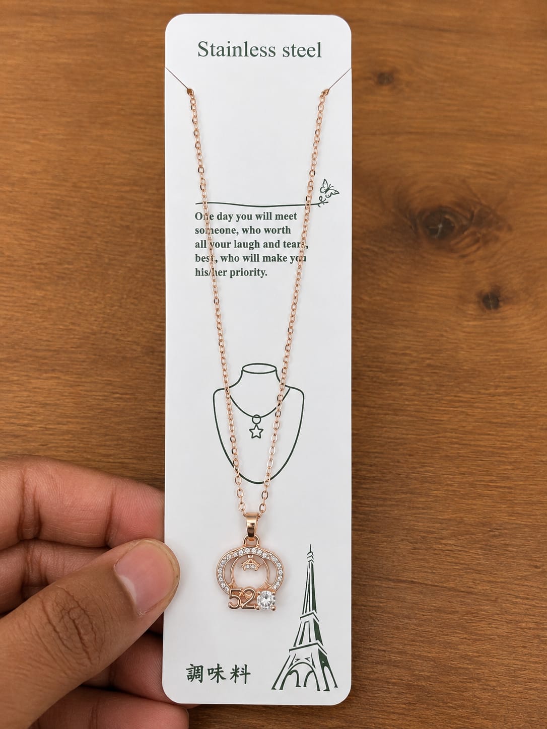 Rose gold-tone 520 pendant necklace with crown motif and clear stones